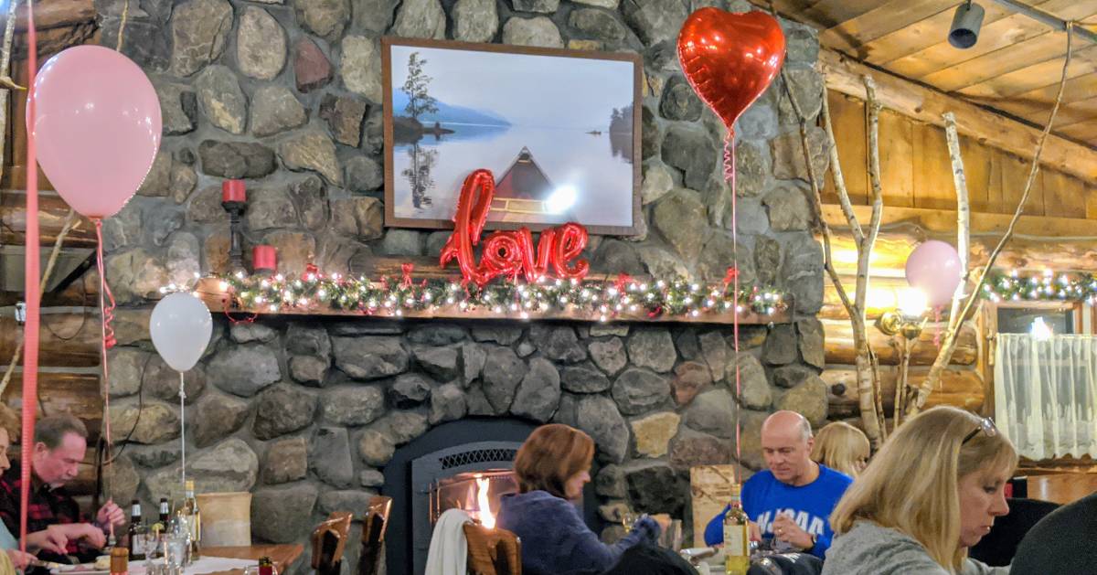 restaurant with fireplace decorated for Valentine's Day