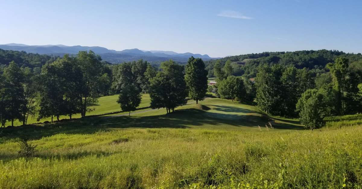 scenic golf course with trees