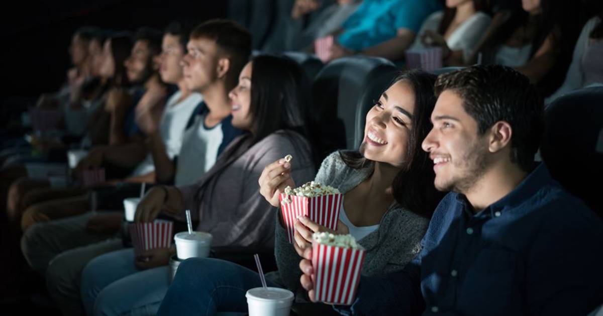 people in movie theater seats