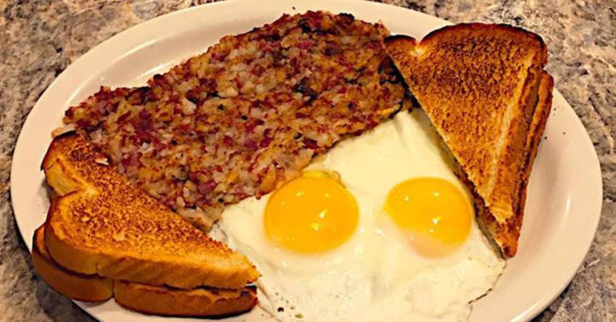 eggs, hash, and toast on a plate
