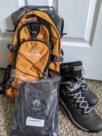 yellow hiking backpack with boots