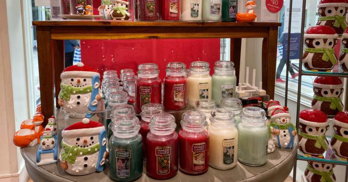 collection of holiday candles on display