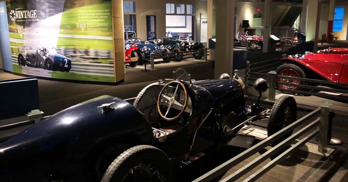 antique cars in a museum
