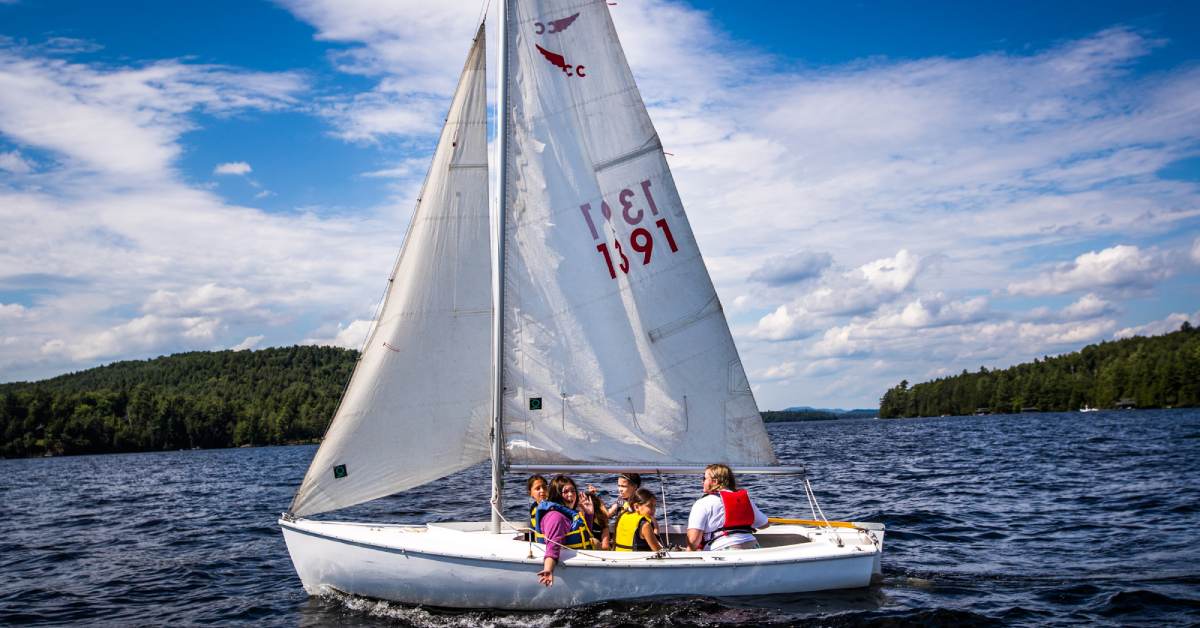 children in a boat on a sunny day