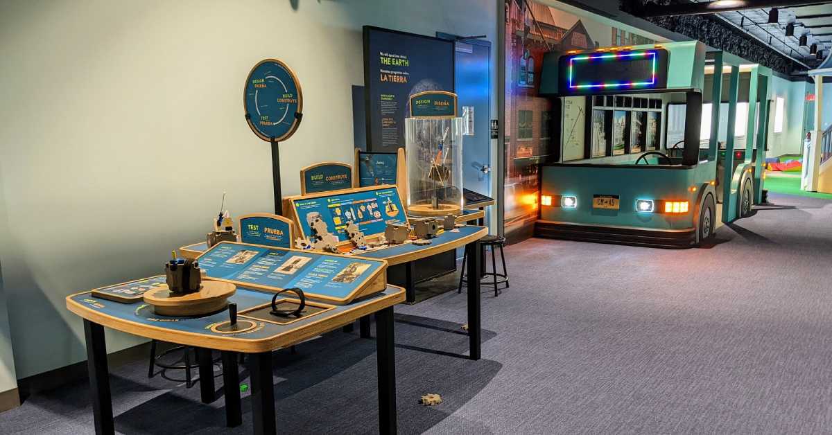 a children's museum with interactive displays and a bus