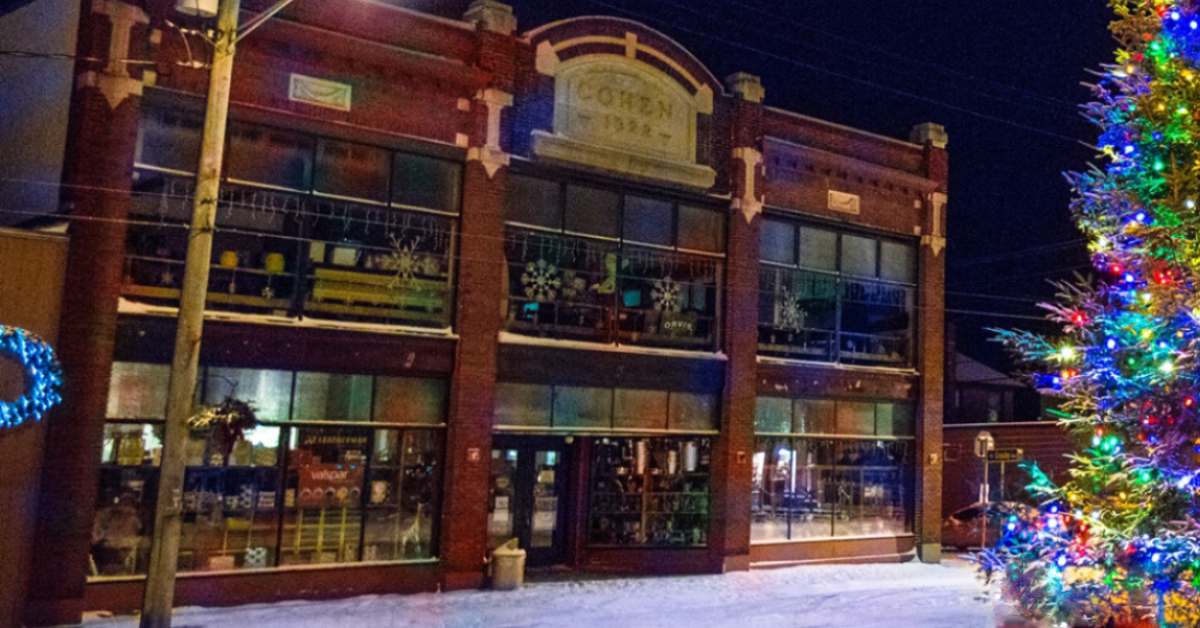 downtown old forge with christmas tree next to hardware store 