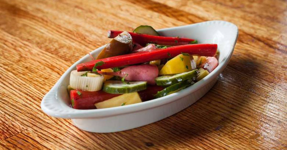 veggies in a dish on a wooden table