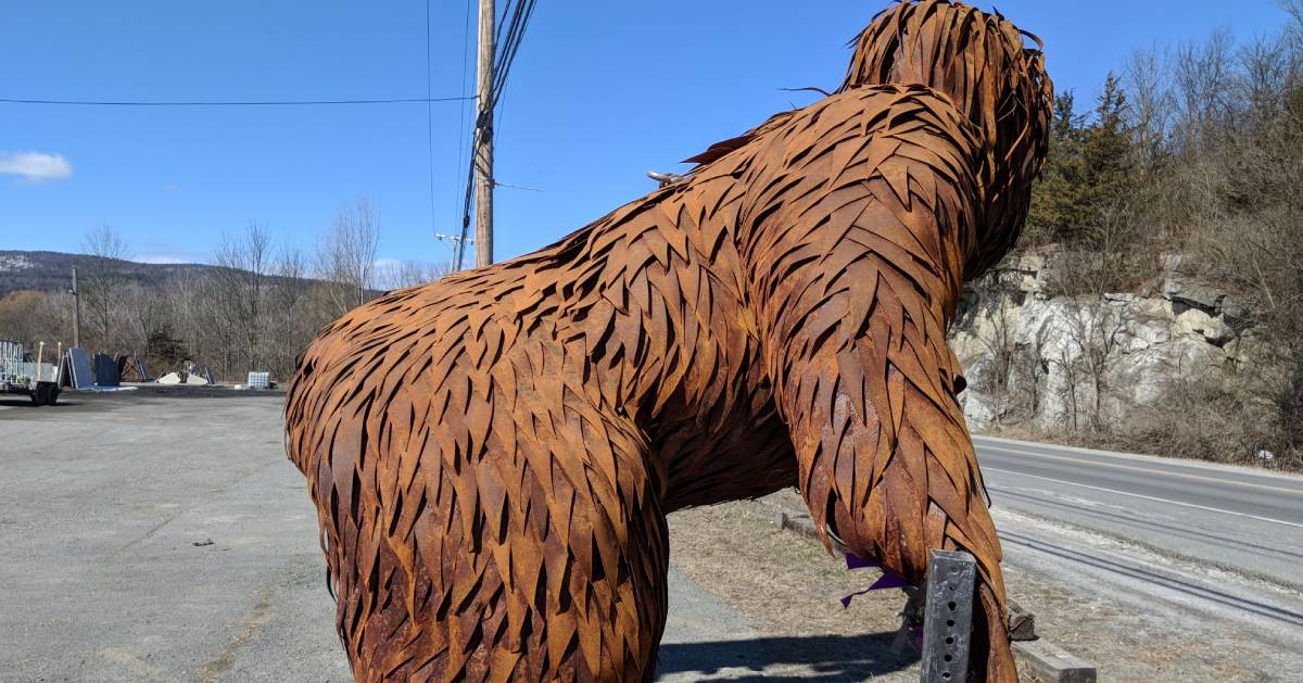 statue of a Bigfoot from the side