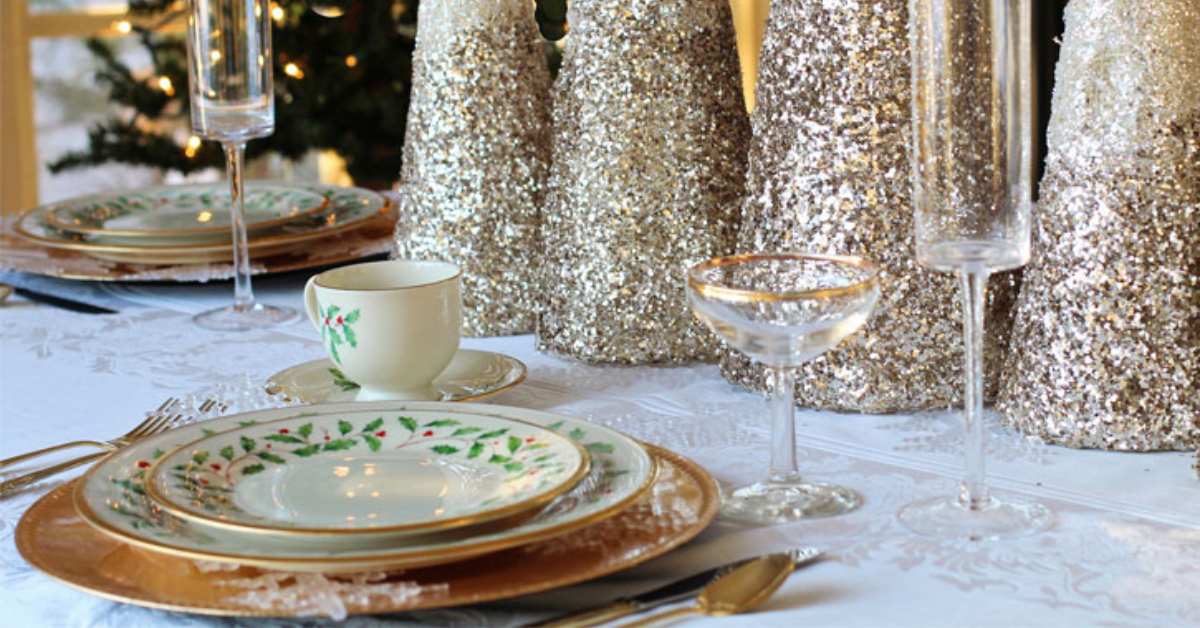 a set table decorated for Christmas