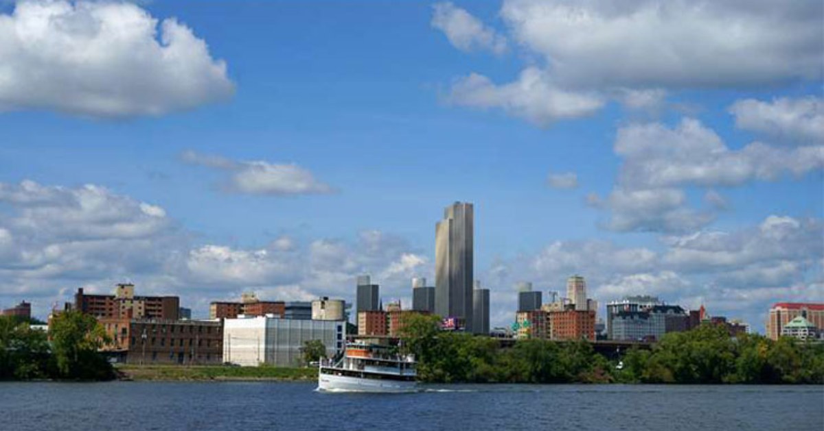 boat on the Hudson River with the Albany skyline in the background