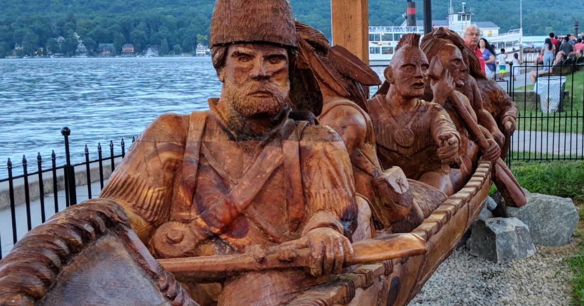 canoe sculpture of Robert Rogers and five Native Americans