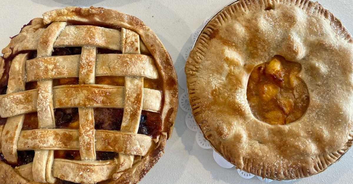 two pies, one with a lattice top and the other with a hole on top