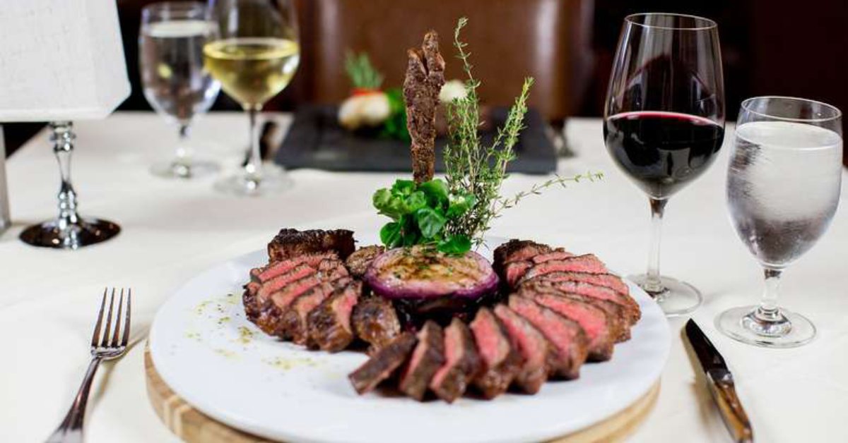 steak dinner on a white tablecloth