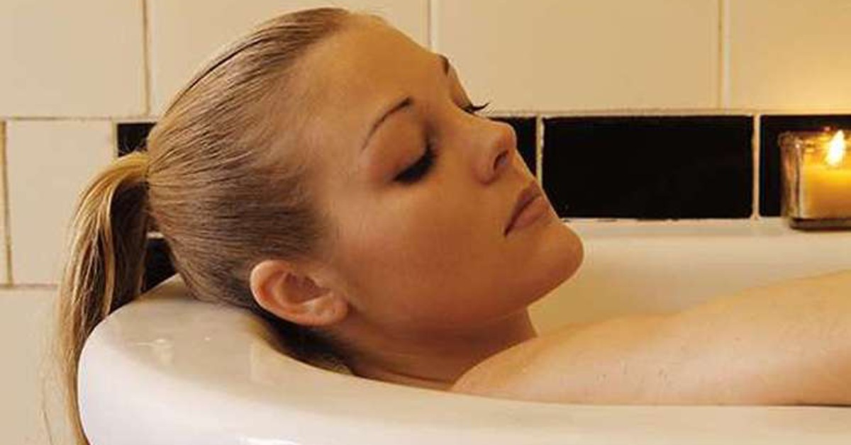 woman soaking in a tub