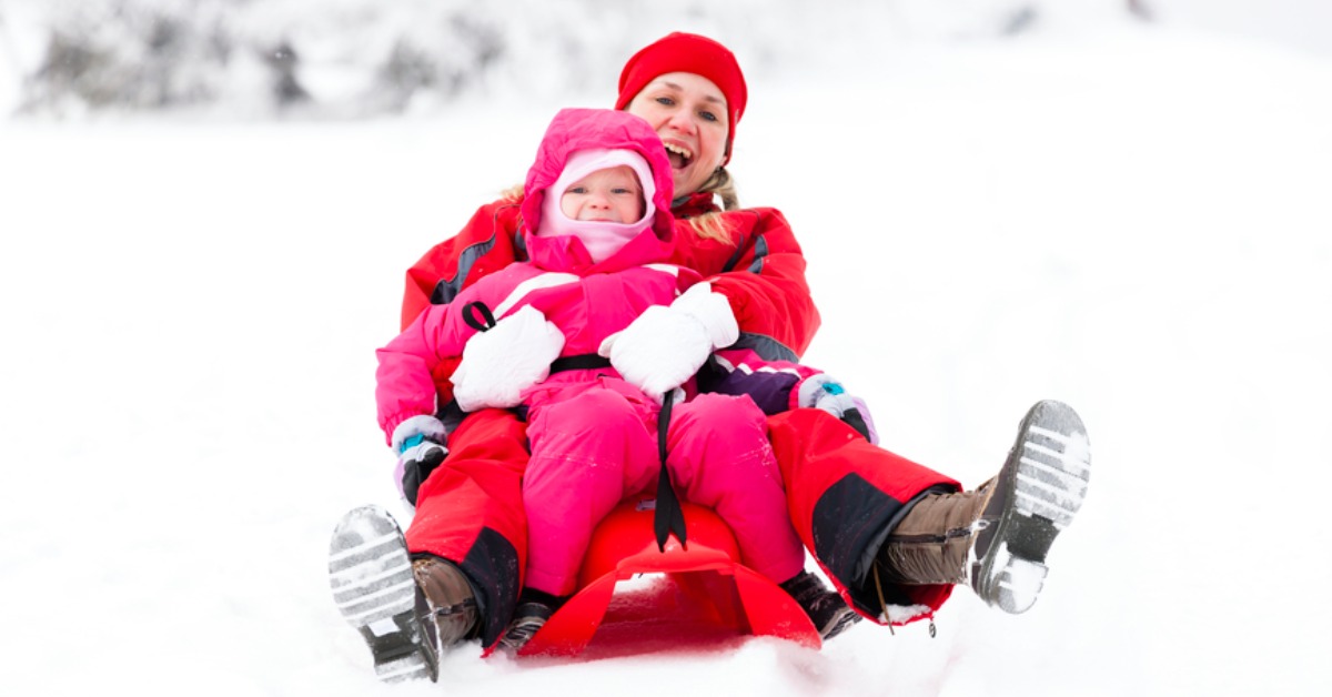 mother and child sledding