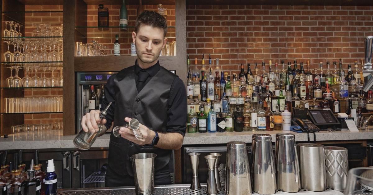 bartender makes a cocktail