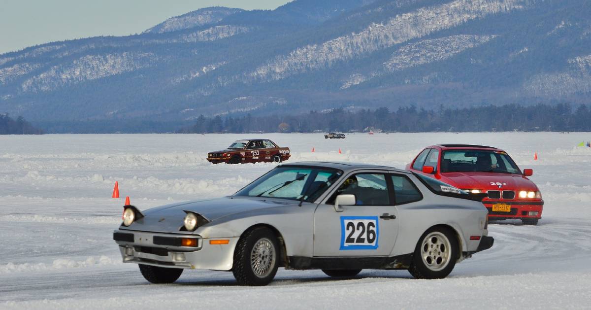 cars racing on a lake