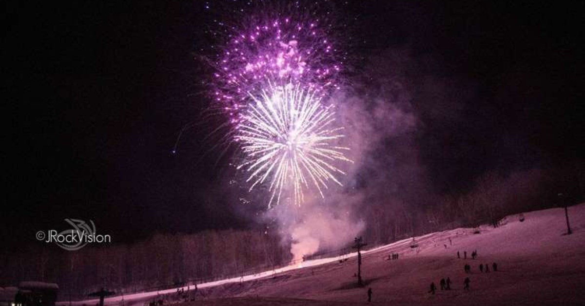fireworks over a ski mountain