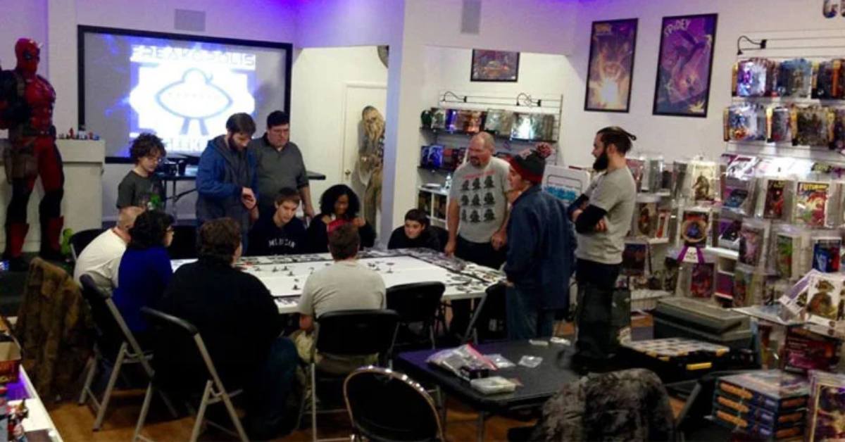 people seated around a gaming table in a game shop