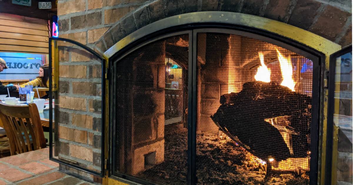 fire in fireplace in restaurant