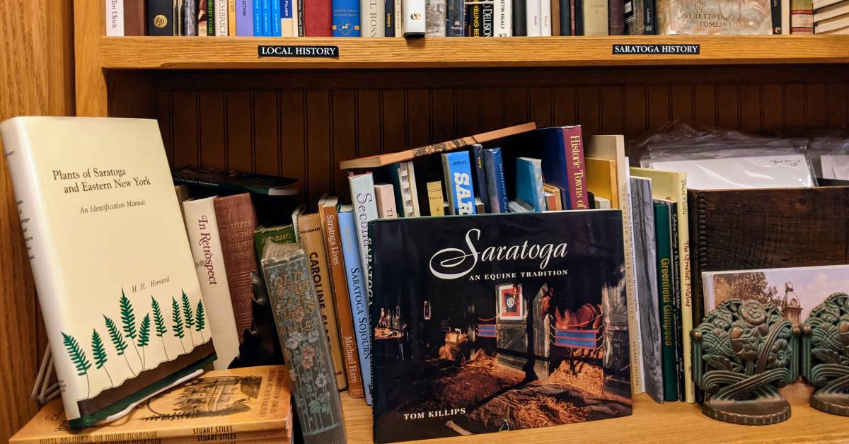 Saratoga and local books section on bookshelves