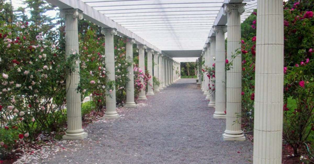 a pathway with columns through Yaddo Gardens