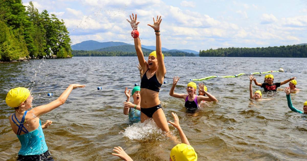 campers swim in lake