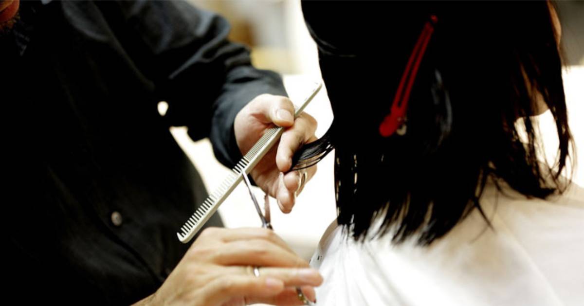 women getting her hair cut