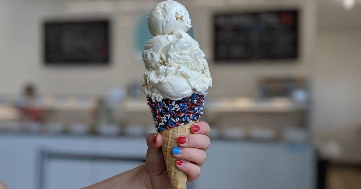 hand holding ice cream cone