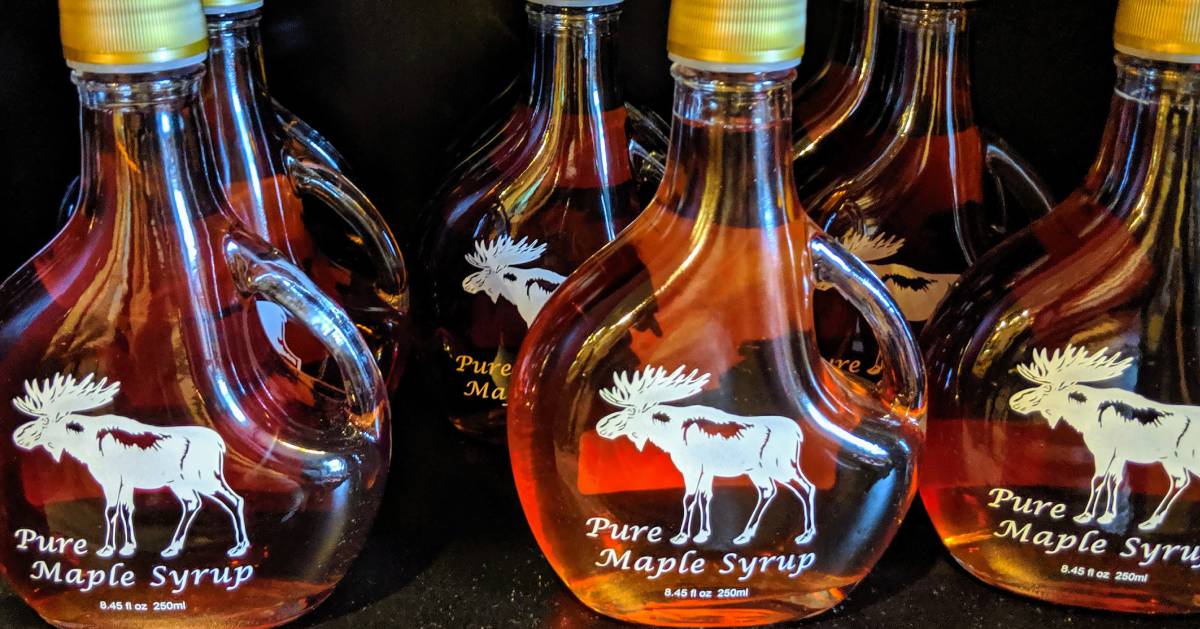 jars of maple syrup with moose on them