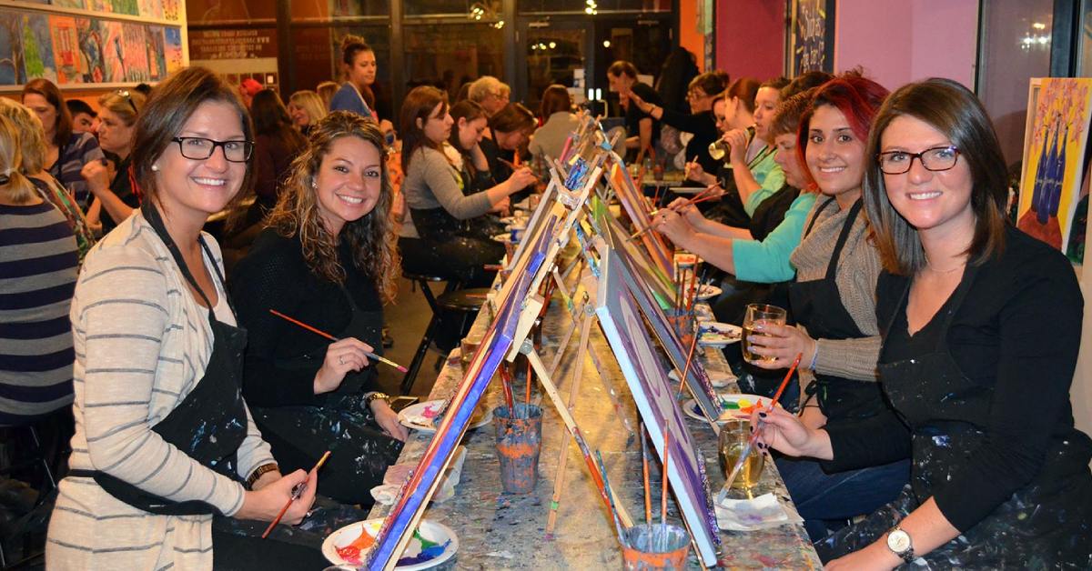 women at a paint and sip class