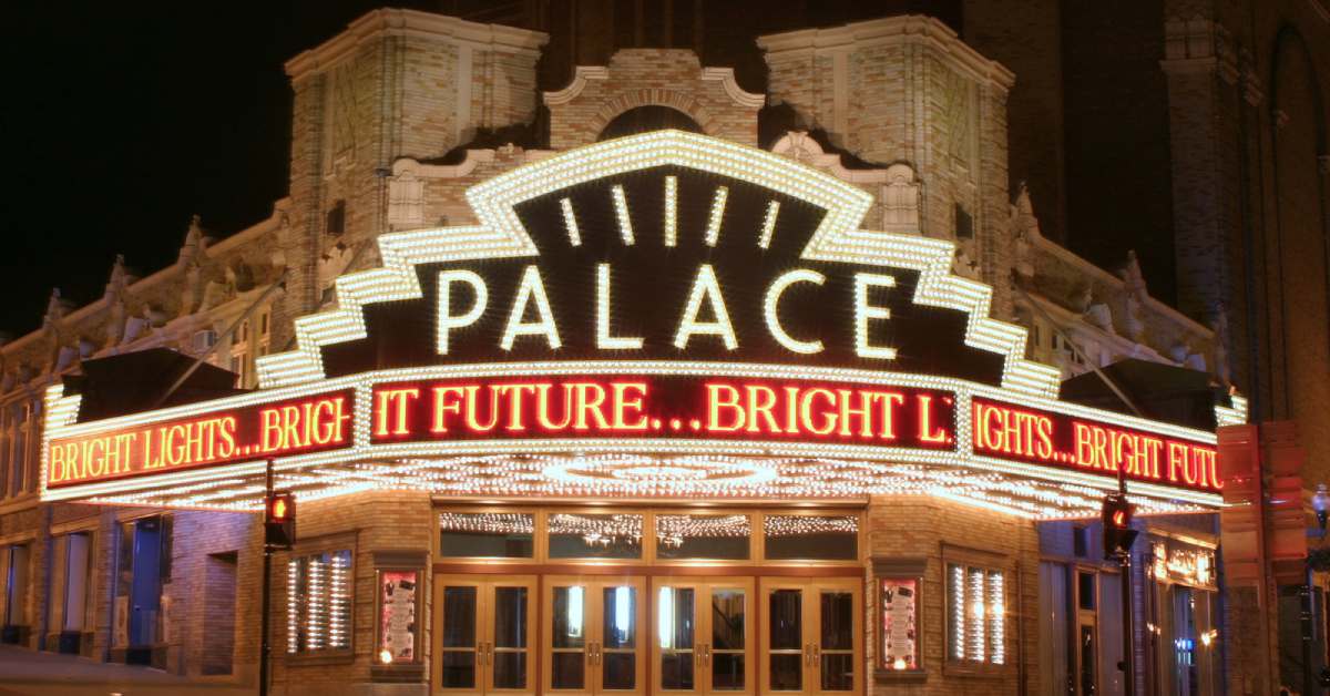 exterior of the palace theatre lit up at night