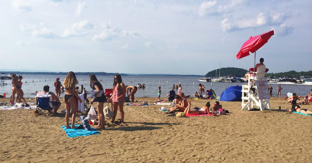 people swimming and sun bathing at brown's beach