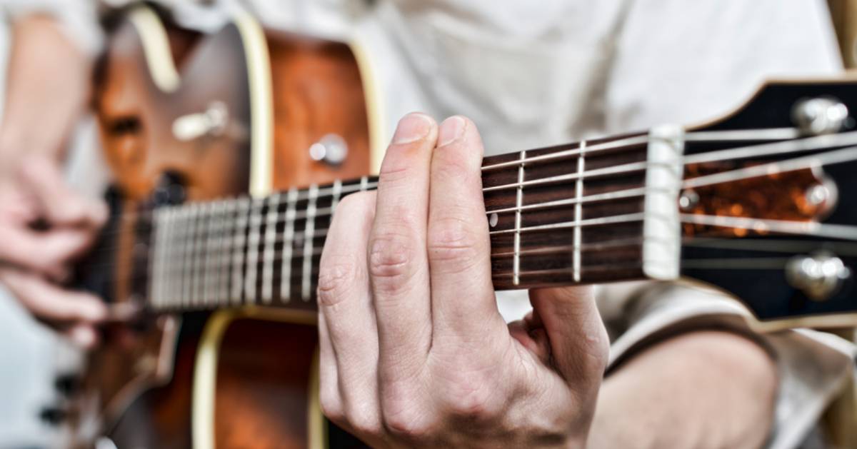 a guitar player close up
