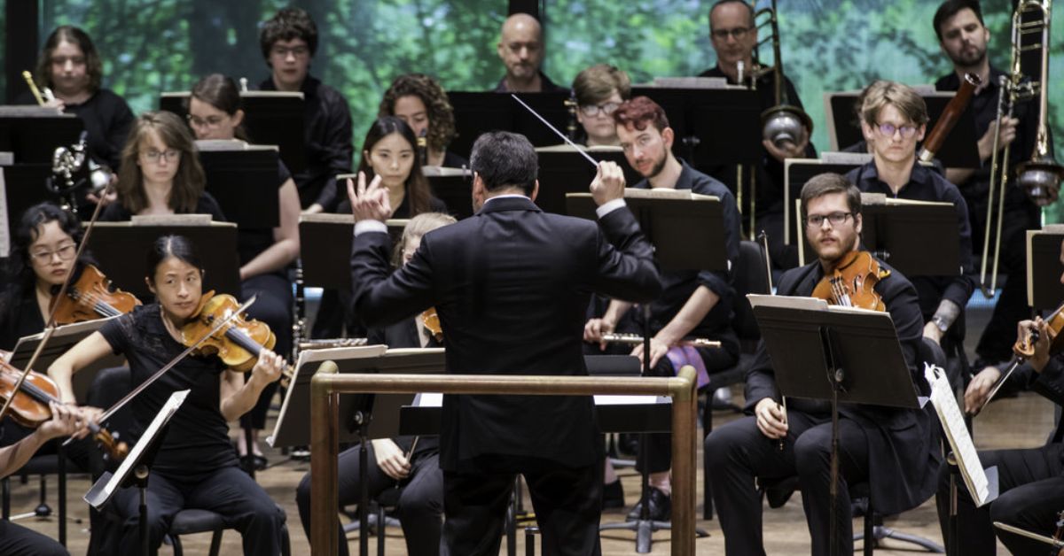 view of an ensemble performing on stage