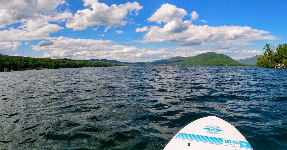 tip of a paddleboard in the water