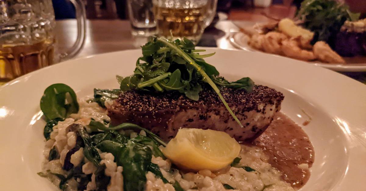 fish and risotto plated