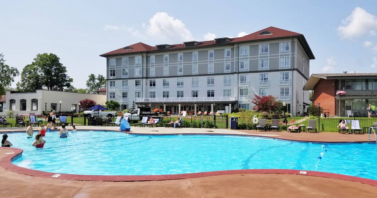 large hotel with outdoor pool