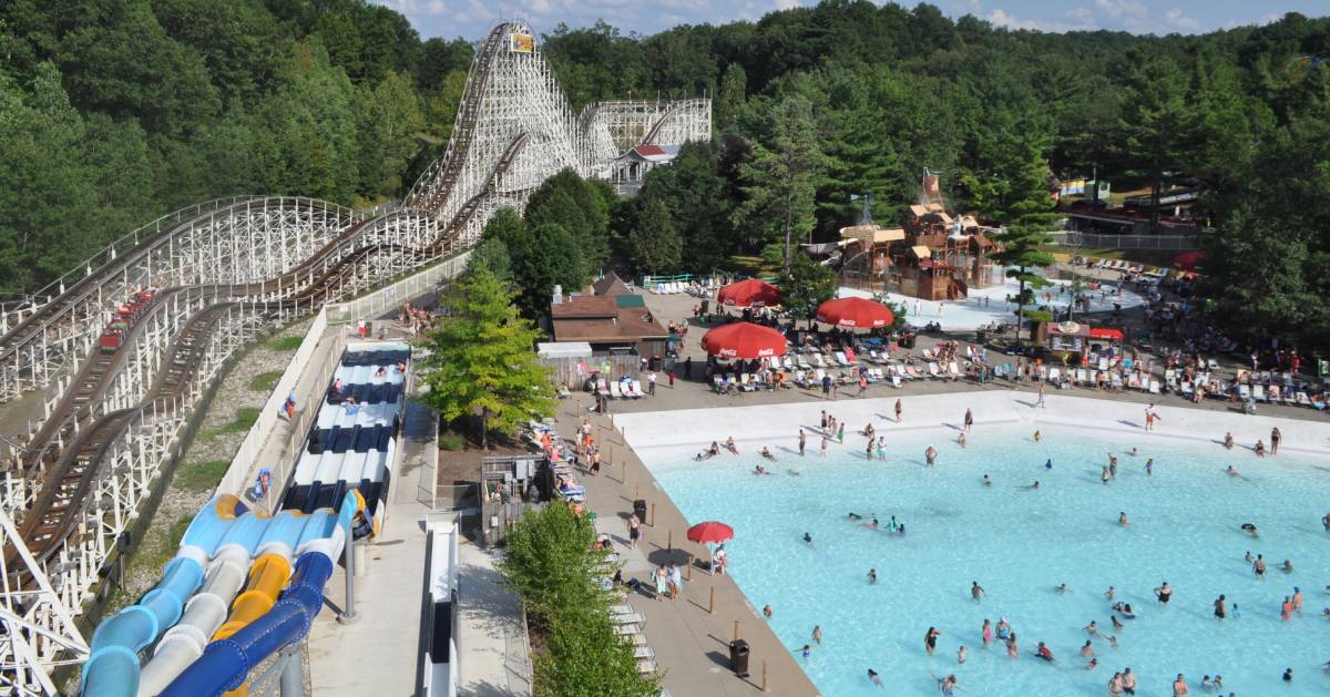 aerial view of roller coaster and pool