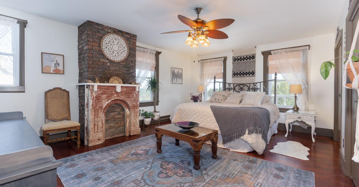 farmhouse guest room with antique decor