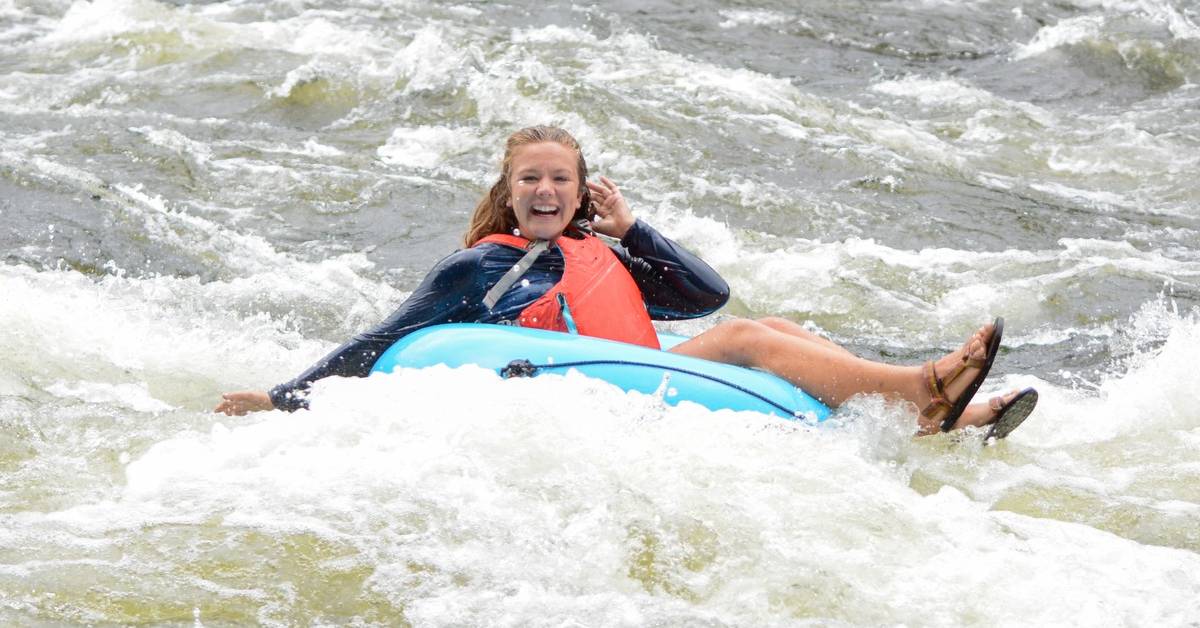 a woman tubes in water