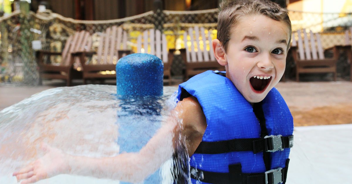 kid at indoor water park