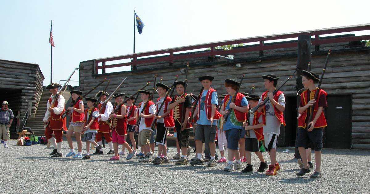 line of kids dressed like soldiers