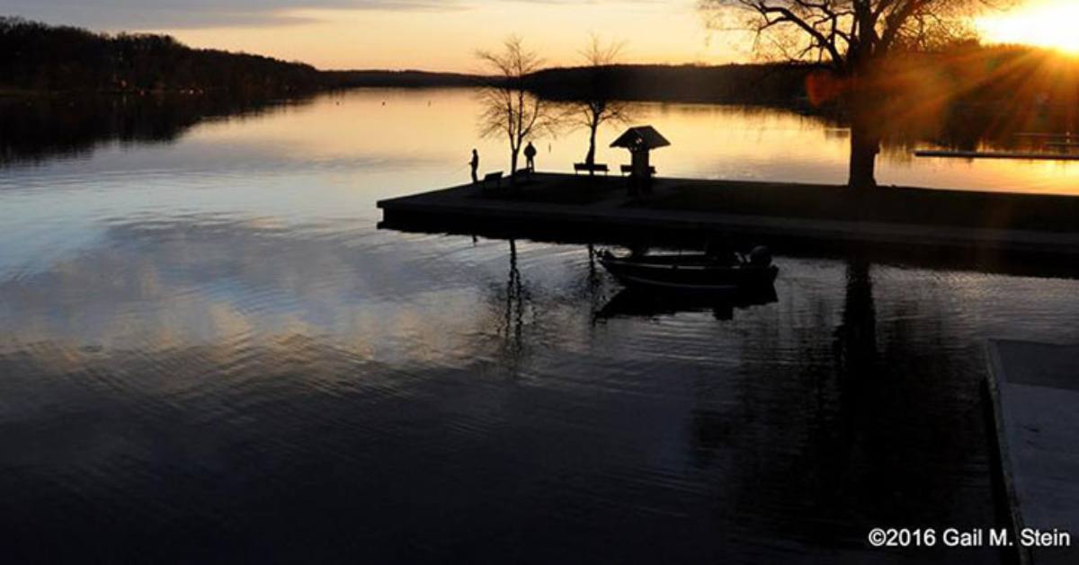 fishing at lake in the evening