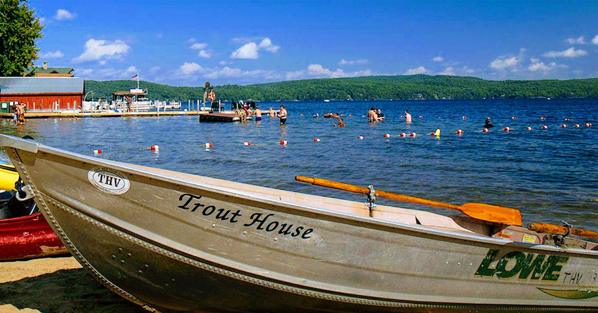 Trout House canoe by the water