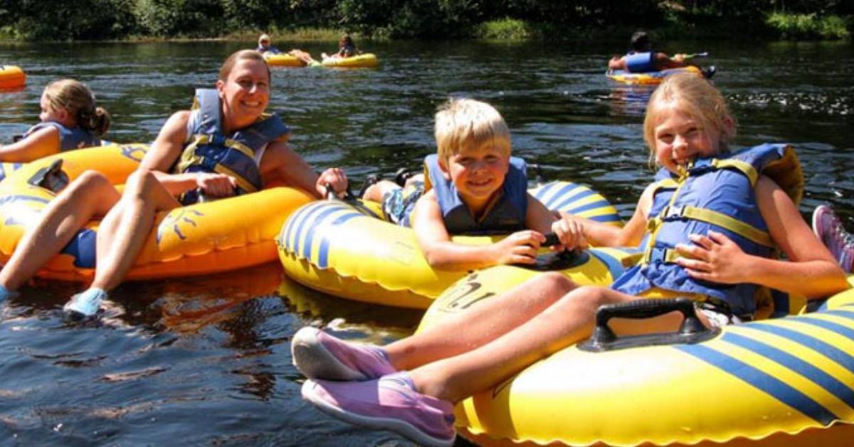 kids on tubes in water