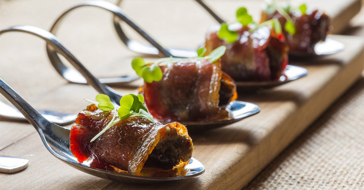 bacon wrapped appetizers on spoons