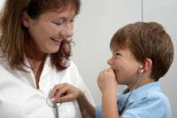 child playing with stethoscope