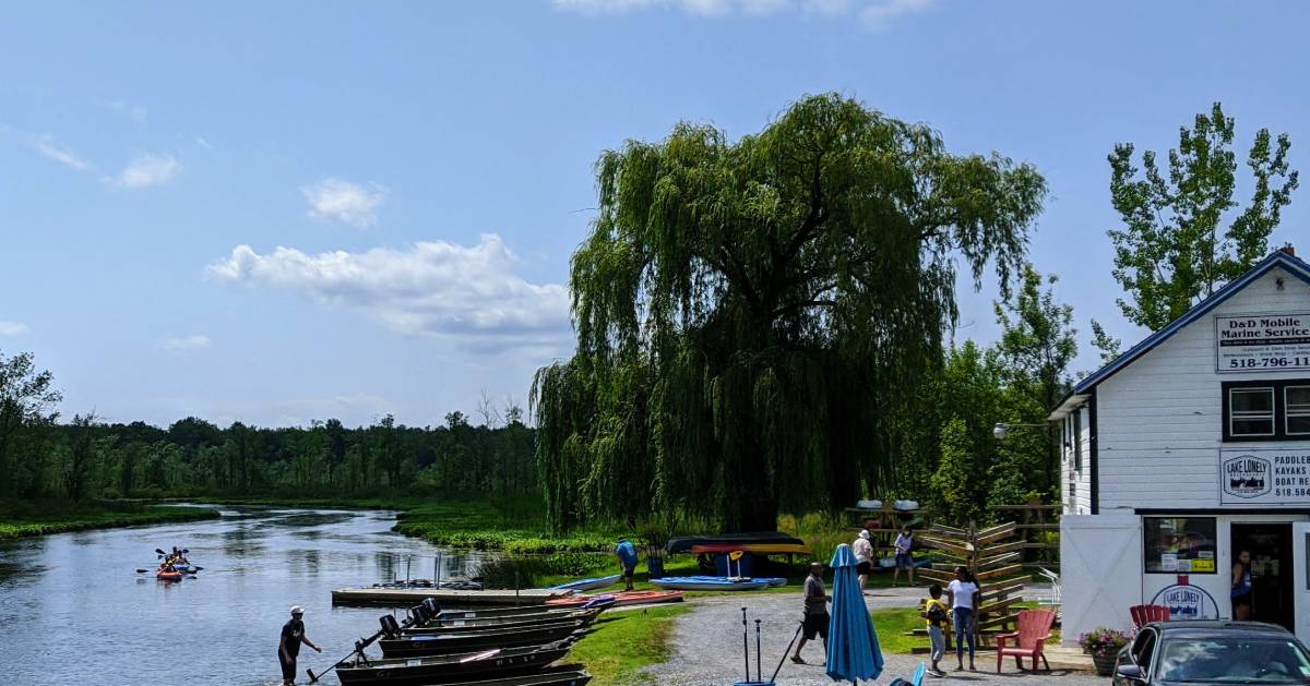 kayaks in water by kayak rental place