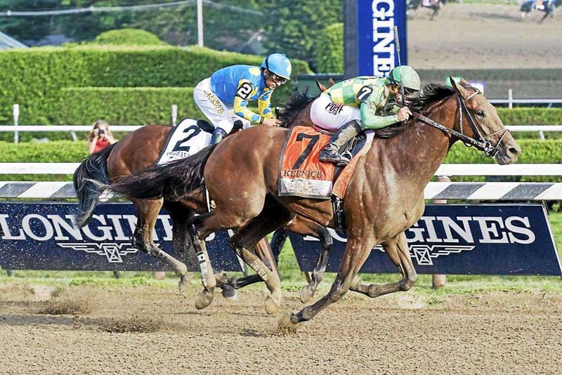 Horses racing at the Saratoga Race Course